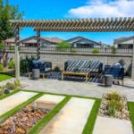 Rear,Yard,Lattice,Pergola,With,Wicker,Patio,Furniture